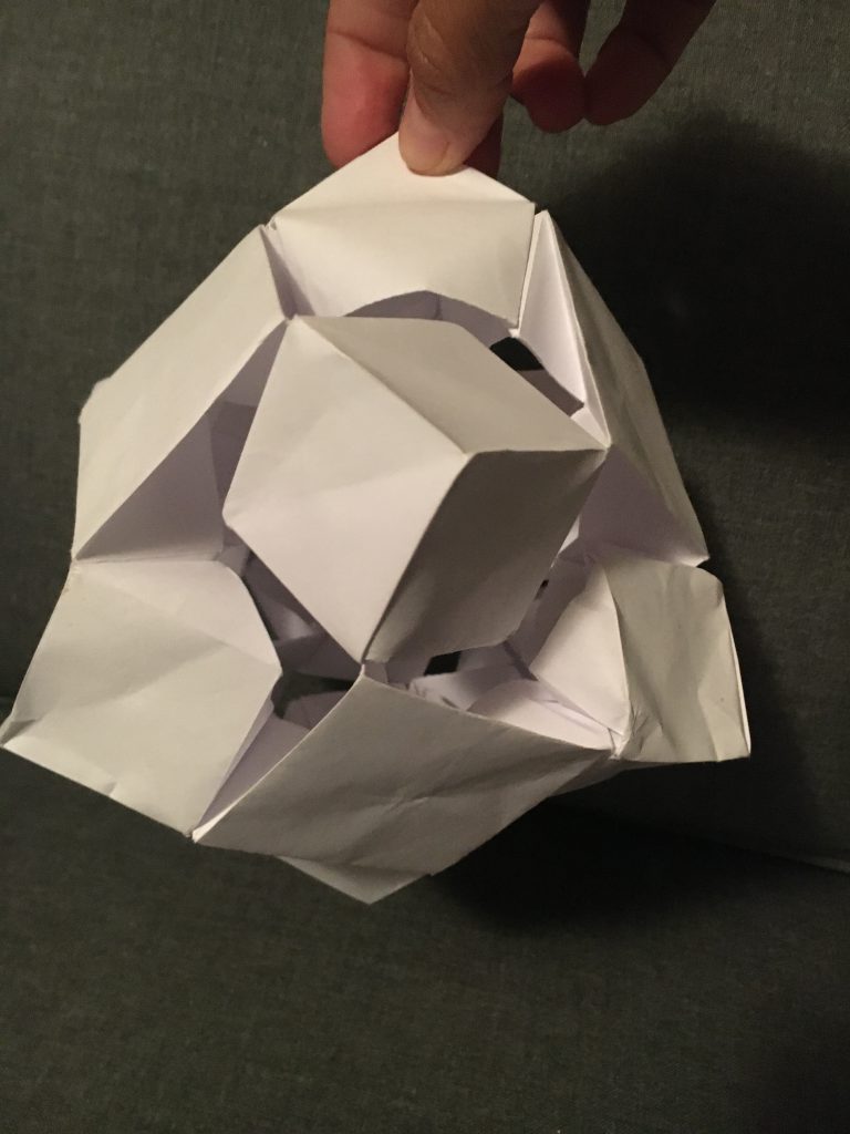 Sample: Tenzin W.-P. (Age 9) - Skewb Cube. Design by Jeromy Shaffer.