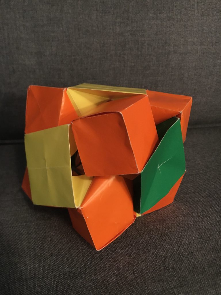 Honor Mention: Tenzin W.-P. (Age 9) - Skewb Cube. Design by Jeromy Shaffer.